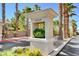 Welcome sign with community name, with lush landscaping, trees, and street access at 9050 W Warm Springs Rd # 1074, Las Vegas, NV 89148