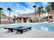 Resort-style community pool with lounge chairs and a covered cabana at 9050 W Warm Springs Rd # 1074, Las Vegas, NV 89148