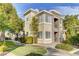 Well-maintained two-story townhome with lush landscaping, sidewalks, and a charming community feel at 9050 W Warm Springs Rd # 1074, Las Vegas, NV 89148