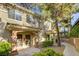 Charming townhome with inviting front porch, covered entrances, and well-maintained landscaping at 9050 W Warm Springs Rd # 1074, Las Vegas, NV 89148