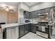 Well-equipped kitchen with stainless steel appliances and sleek countertops at 9050 W Warm Springs Rd # 1074, Las Vegas, NV 89148