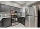 Modern kitchen featuring stainless appliances, modern cabinets, and elegant countertops at 9050 W Warm Springs Rd # 1074, Las Vegas, NV 89148