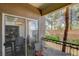 Charming patio view from home's sliding glass door, complete with table and seating at 9050 W Warm Springs Rd # 1074, Las Vegas, NV 89148