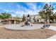 Community playground with a slide, benches, and shaded picnic area at 9050 W Warm Springs Rd # 1074, Las Vegas, NV 89148
