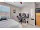 Bedroom showcasing a bed, desk area, and a ceiling fan at 946 Belton Lake Ave, North Las Vegas, NV 89086