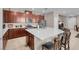 Well-equipped kitchen with stainless steel appliances, a large center island, and ample cabinet space at 946 Belton Lake Ave, North Las Vegas, NV 89086