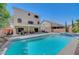 Backyard pool and spa offers a luxurious outdoor experience with ample seating and relaxation areas at 9656 Paraiso Springs St, Las Vegas, NV 89139