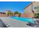 Sparkling swimming pool with refreshing water and a sun-soaked patio area at 9656 Paraiso Springs St, Las Vegas, NV 89139