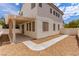 Backyard featuring a covered patio and low-maintenance landscaping at 9740 Floweret Ave, Las Vegas, NV 89117