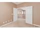 Upstairs foyer featuring a view of decorative hanging lights at 9740 Floweret Ave, Las Vegas, NV 89117