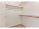 Walk-in closet features wire shelving for organizing clothes and storage and plush carpeting at 9740 Floweret Ave, Las Vegas, NV 89117