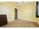 This bedroom features a spacious closet, neutral carpet and a ceiling fan at 977 Trackers Glen Ave, Henderson, NV 89015