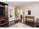 Cozy living room featuring hardwood floors and staircase to the 2nd floor at 977 Trackers Glen Ave, Henderson, NV 89015