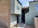 Side view of multi-Gathering building with stucco and brick, showcasing the entrance and stairs at , Las Vegas, NV 89119