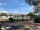 Community swimming pool enclosed by a wrought-iron fence on a sunny day at , Las Vegas, NV 89119
