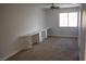 Carpeted bedroom that has a built-in desk area and a bright sunny window, perfect for work or relaxing at , Las Vegas, NV 89128