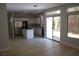Bright open kitchen with stainless steel appliances, a center island, and direct access to the outdoor living space at , Las Vegas, NV 89128