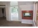 The primary bedroom features a cozy fireplace and access to the ensuite bathroom, creating a private retreat at , Las Vegas, NV 89128