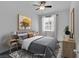 Cozy bedroom with large wall art, a comfy bed with throw pillows, and neutral color palette at 1063 Upper Springs St, Henderson, NV 89002