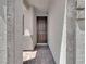 Inviting entryway with a covered porch and a stylish dark brown front door, perfect for a warm welcome at 1063 Upper Springs St, Henderson, NV 89002