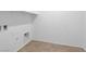 Bright laundry room features tile floors and modern hookups, offering a clean and functional space at 1063 Upper Springs St, Henderson, NV 89002