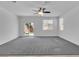 Bright living room with sliding glass doors leading to the outdoor space at 1063 Upper Springs St, Henderson, NV 89002