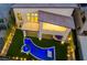 Aerial view of backyard with pool, spa, and patio, perfect for outdoor entertaining at 10748 Steel Ridge Ct, Las Vegas, NV 89135