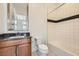 Bathroom featuring a shower and a tub with a decorative tile border at 10748 Steel Ridge Ct, Las Vegas, NV 89135