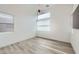 Bright bedroom with light wood floors and modern lighting at 10748 Steel Ridge Ct, Las Vegas, NV 89135