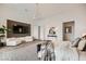 Spacious main bedroom boasts a modern design with wood accents and elegant furniture at 10748 Steel Ridge Ct, Las Vegas, NV 89135