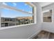 Scenic window view showcasing the neighboring homes and desert landscape at 10748 Steel Ridge Ct, Las Vegas, NV 89135
