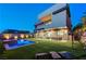 Beautiful backyard featuring a sparkling pool, modern landscaping, and spacious seating area for relaxing outdoors at 1181 Calle De Luz, Henderson, NV 89012