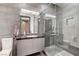 Modern bathroom featuring a glass-enclosed shower and sleek vanity at 1181 Calle De Luz, Henderson, NV 89012