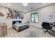 Bright bedroom with a modern design featuring a large superhero mural on the wall at 1181 Calle De Luz, Henderson, NV 89012