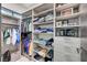 This walk-in closet boasts custom shelving and drawers for maximum storage solutions at 1181 Calle De Luz, Henderson, NV 89012