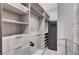 Organized walk-in closet with custom shelving and storage solutions at 1181 Calle De Luz, Henderson, NV 89012
