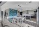 The dining area features modern chandelier, wine storage, and adjoins kitchen for easy entertaining at 1181 Calle De Luz, Henderson, NV 89012