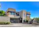 Contemporary two-story home featuring a stylish garage door and modern architectural design at 1181 Calle De Luz, Henderson, NV 89012