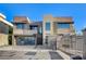 Modern home featuring a gated entrance, clean lines, and an attached garage at 1181 Calle De Luz, Henderson, NV 89012