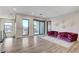 Open living area with modern decor and access to an outdoor balcony at 1181 Calle De Luz, Henderson, NV 89012