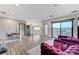 Bright living area with modern furnishings and access to an outdoor balcony at 1181 Calle De Luz, Henderson, NV 89012