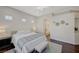 Spacious bedroom featuring natural light, hardwood floors, and neutral wall colors at 12 Kennesaw Rd, Henderson, NV 89052
