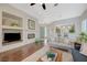 Inviting living room with fireplace, wood floors, and stylish decor creates a cozy atmosphere at 12 Kennesaw Rd, Henderson, NV 89052