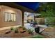 Charming covered patio with outdoor seating and a grill, perfect for entertaining or relaxing at 12 Kennesaw Rd, Henderson, NV 89052