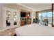 Bedroom featuring a beverage bar, closet, views and a comfortable king-sized bed at 145 E Harmon Ave # 3807, Las Vegas, NV 89109