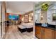 The well-appointed bedroom suite features a comfortable bed, stylish seating, and scenic city views at 145 E Harmon Ave # 3807, Las Vegas, NV 89109