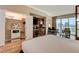 Bedroom featuring a beverage bar, closet, views and a comfortable king-sized bed at 145 E Harmon Ave # 3807, Las Vegas, NV 89109