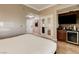 Bedroom featuring a beverage bar, closet and a comfortable king-sized bed at 145 E Harmon Ave # 3807, Las Vegas, NV 89109