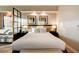 Bedroom with a large bed, nightstands, and modern artwork on the wall at 145 E Harmon Ave # 3807, Las Vegas, NV 89109