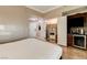Bedroom featuring a beverage bar, closet and a comfortable king-sized bed at 145 E Harmon Ave # 3807, Las Vegas, NV 89109